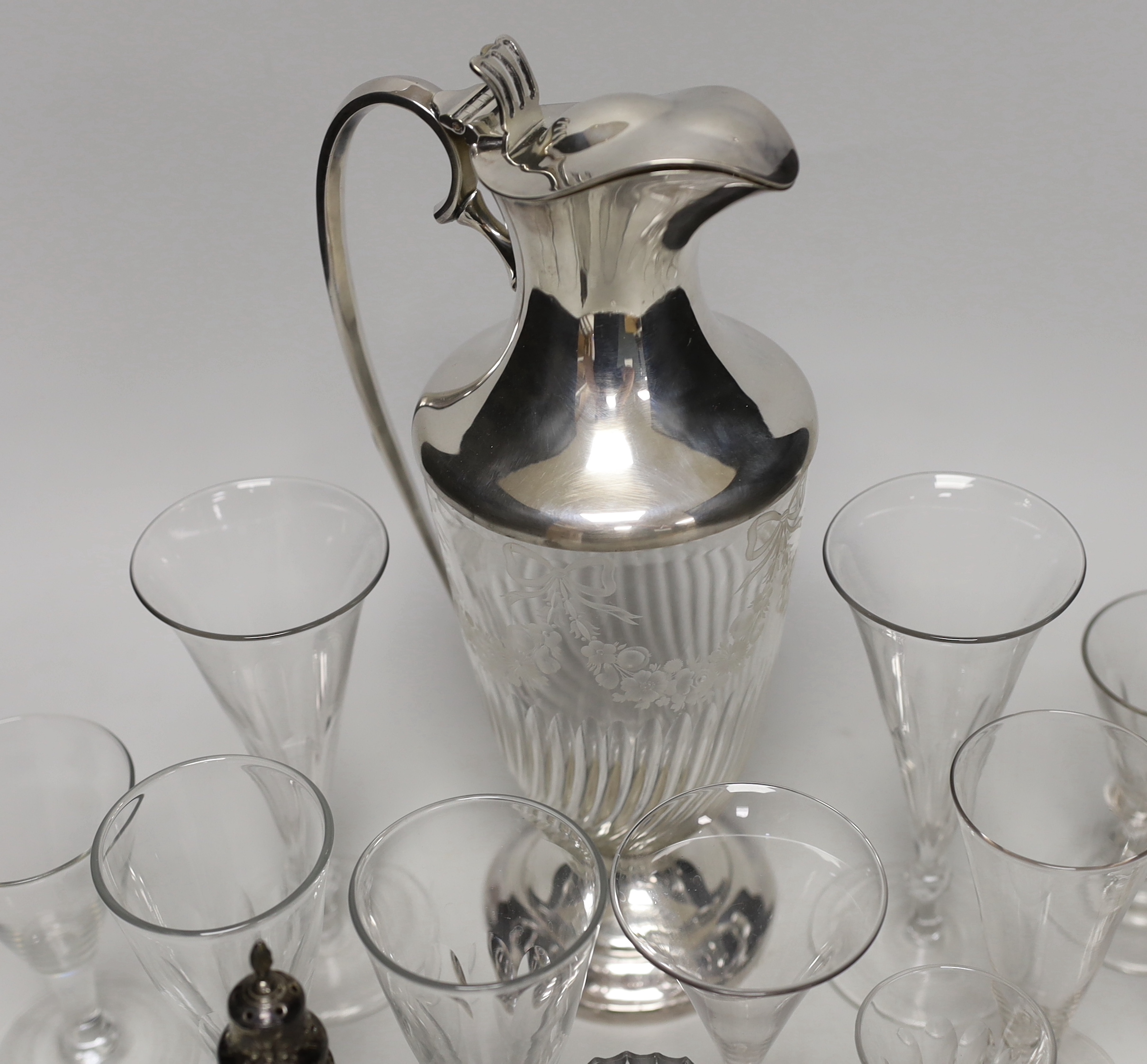 A silver plate mounted glass claret jug and various glasses